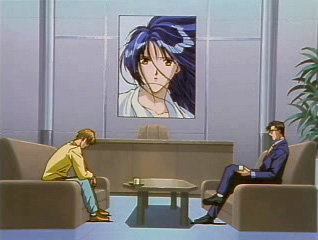 Vlevo Aki, vpravo Kagami. Obzvláště si ale všimněte nepochybně velmi estetického plakátu v pozadí scény.